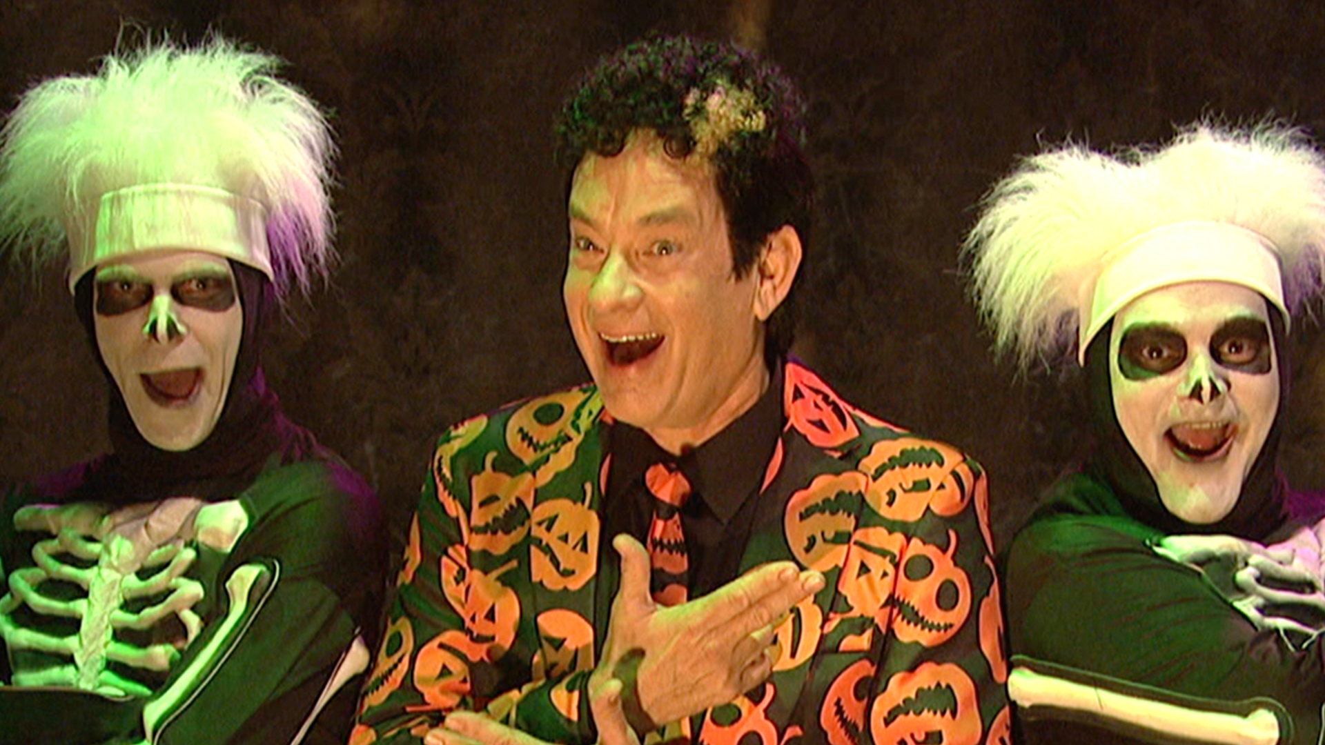 David S. Pumpkins smiles with his skeleton boys