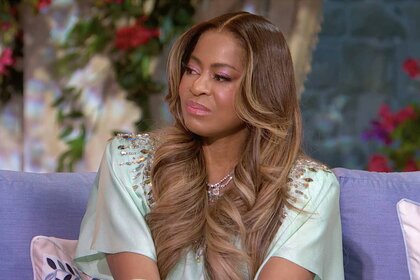 Mary Cosby sits on a purple couch in a light teal dress on The Real Housewives of Salt Lake City Episode 617.