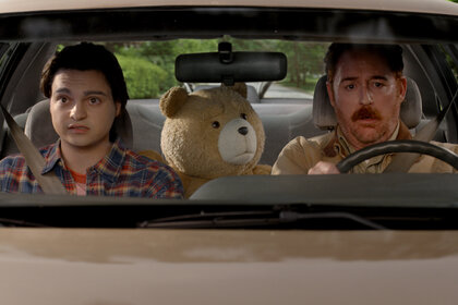 John (Max Burkholder), Ted (Seth MacFarlane), Matty (Scott Grimes) driving a car in Ted season 2.