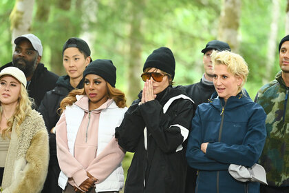 Tara Lipinski, Ron Funches, Kristen Kish, Candiace Dillard Bassett, Lisa Rinna, and Dorinda Medley standing outside together on The Traitors Season 4 Episode 6.
