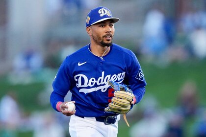 Mookie Betts of the Los Angeles Dodgers jogs across the field in the first inning against the Kansas City Royals.
