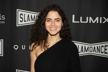 Shannon Gisela smiling in a black dress at the 2025 Slamdance Film Festival.