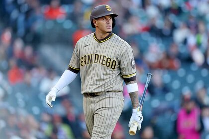 Manny Machado of the San Diego Padres walks back to the dugout after striking out against the San Francisco Giants.
