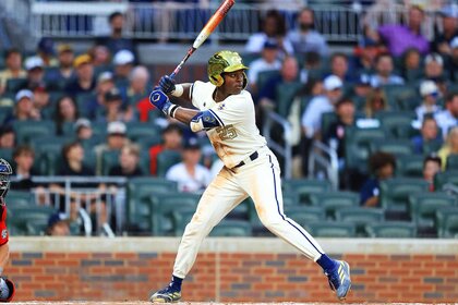 Vahn Lackey of the Georgia Tech Yellow Jackets bats during the Tuesday evening men's college baseball game between the Georgia Bulldogs and the Georgia Tech Yellow Jackets.