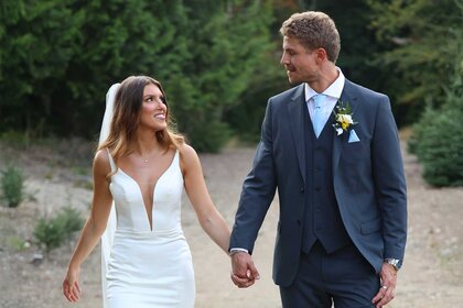 Marissa Meyer and Adam Dehmlow holding hands outdoors Married at First Sight Season 20 Episode 2.
