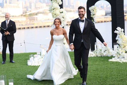 Courtney Landis and Nick Unlenhuth walking down the aisle on Married at First Sight Season 20 Episode 2.