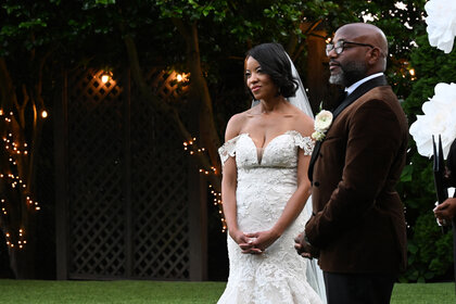 Nikki Jefferson and Shawn Best getting married outdoors.
