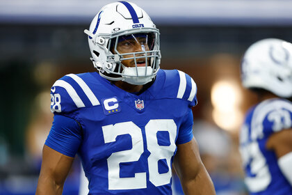 Indianapolis Colts running back Jonathan Taylor during warm ups on a football field.