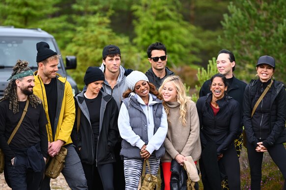 The cast stands outside on The Traitors Episode 407.