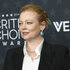 Sarah Snook posing in front of a step and repeat at the 31st Annual Critics Choice Awards.