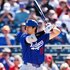 Shohei Ohtani of the Los Angeles Dodgers at bat during the spring training game against the Los Angeles Angels.