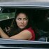 Etta looking back in a car in M.I.A. Season 1.
