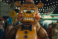 Toy Freddy stands outside in a carnival in Five Nights at Freddy’s 2 (2025).