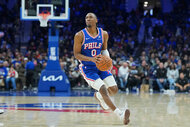 Tyrese Maxey of the Philadelphia 76ers shoots the ball against the Milwaukee Bucks.