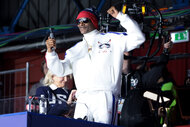 Snoop Dogg at the Milano Ice Skating Arena during the 2026 Milan Cortina Olympics