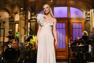 Anya Taylor-Joy dressed in a champaign dress during her monologue on Saturday Night Live Season 46 Episode 20.
