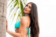 Parmida Keshani posing by a tree on Love Island USA Season 8 Episode 17.