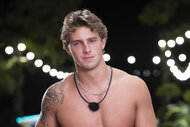Caleb McDaniel shirtless in white short in Love Island USA Season 8.