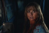 A close up of Pamela Voorhees with a fearful look in Crystal Lake Season 1.