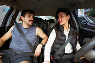 Felipe Cruz and Tori Dahl driving in a car together.