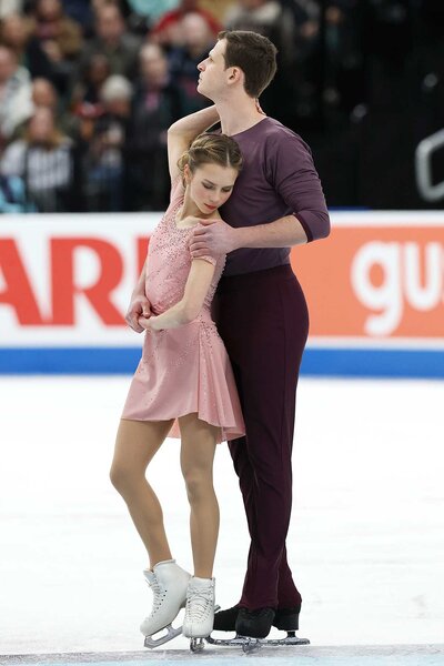 Alisa Efimova and partner, Misha Mitrofanov, positioned for competition in the Championship Pairs Free Skating during the 2026 United States Figure Skating Championships.