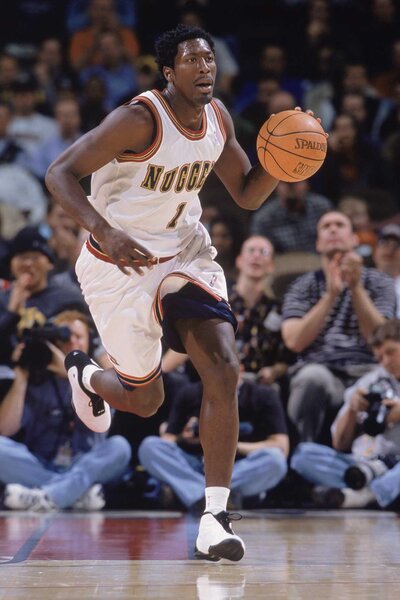 Donnell Harvey of the Denver Nuggets advances the ball during the game against the Utah Jazz.