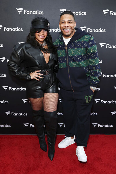 Ashanti and Nelly on the 2026 Fanatics Super Bowl Party arrivals carpet.