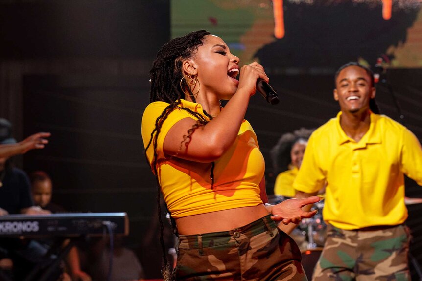 Actress Chloe Bailey singing on the set of Praise This.