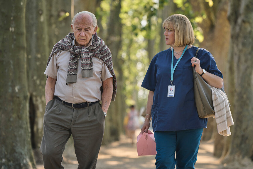 Harvey Keitel (L) and Melanie Lynskey (R) in The Tattooist Of Auschwitz