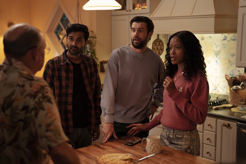 Naveen (Kapil Talwakar), Rob (Jack Whitehall), and Samira (Keke Palmer) speak with a man in a kitchen on The Burbs Episode 107.