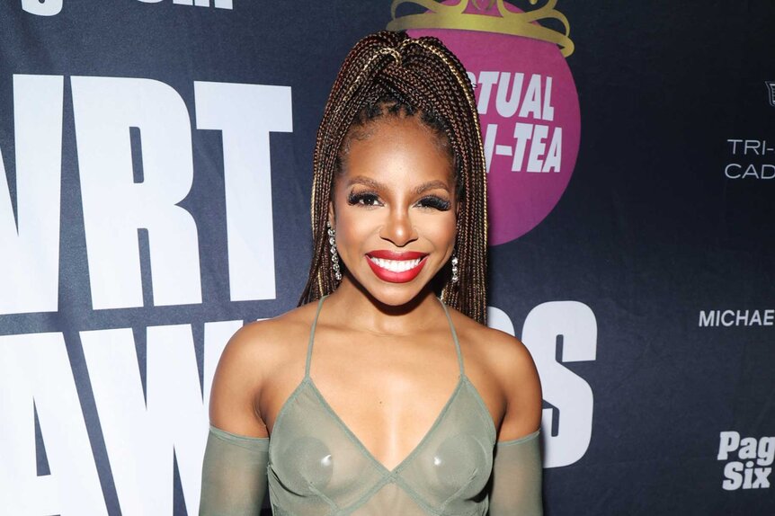 Candiace Dillard Bassett smiling and posing at the 2025 Page Six Virtual Reali-Tea Awards.