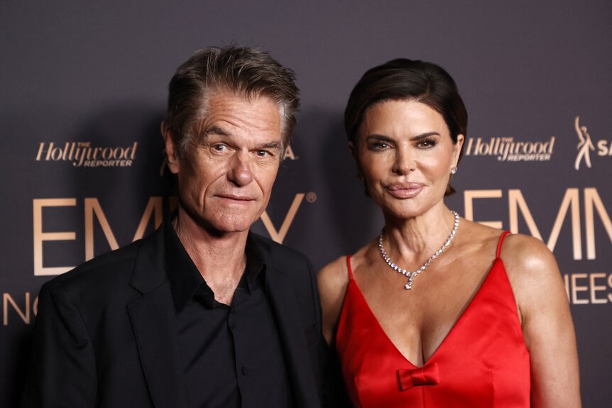 Lisa Rinna and Harry Hamlin pose together.