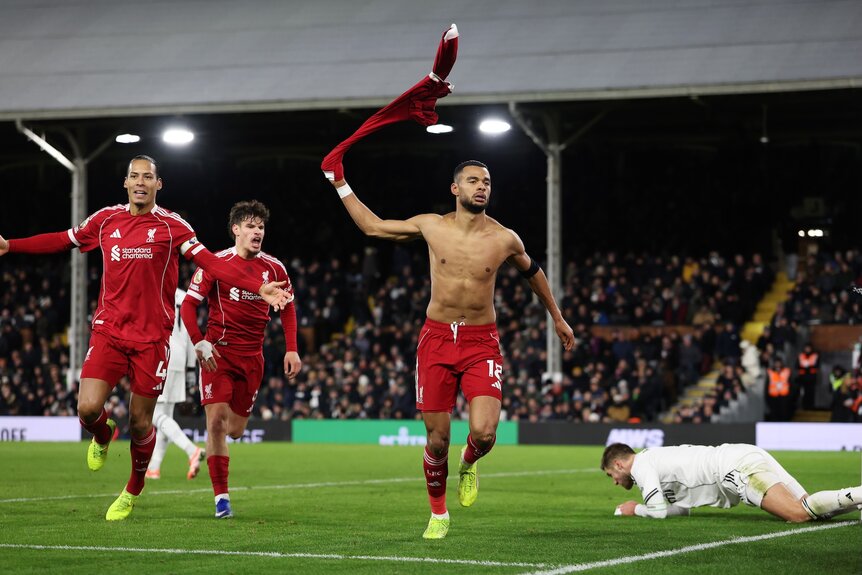 Cody Gakpo of Liverpool celebrates scoring his team's second goal with teammates Virgil van Dijk and Milos Kerkez.