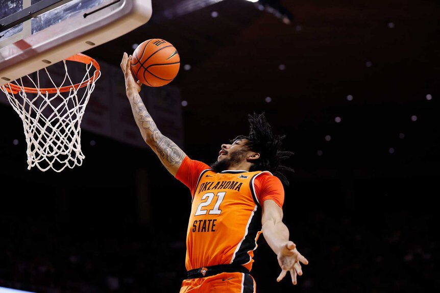 Isaiah Coleman of the Oklahoma State Cowboys shoots the ball in the second half of play.