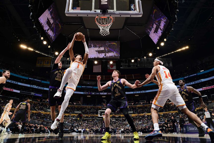 Jalen Johnson of the Atlanta Hawks drives to the basket during the game against the Los Angeles Lakers.