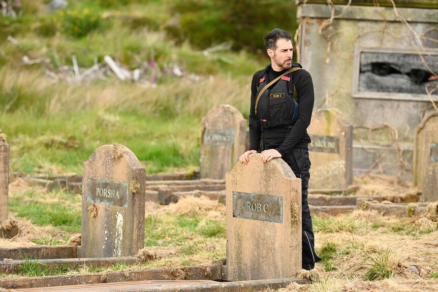 Rob Cesternino in a cemetery The Traitors Season 4 Episode 1.