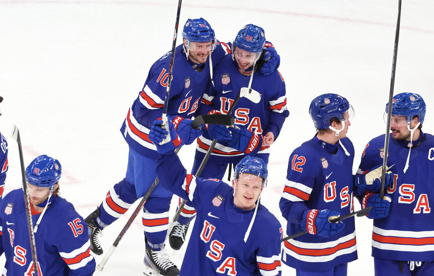 Quinn Hughes and JT Miller of the Men's Hockey Team USA celebrating his victory goal