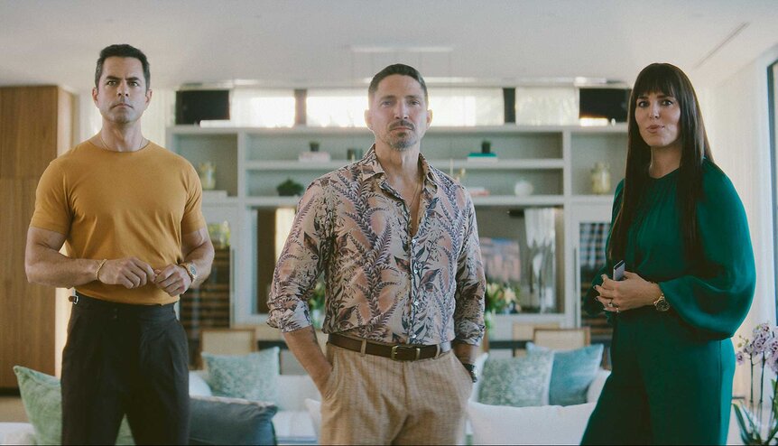 Samuel, Mateo, and Caroline standing next to each other in M.I.A. Season 1 Episode 2.