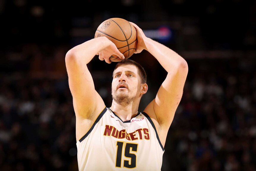 Nikola Jokic of the Denver Nuggets shoots a free throw during the game against the Golden State Warriors.