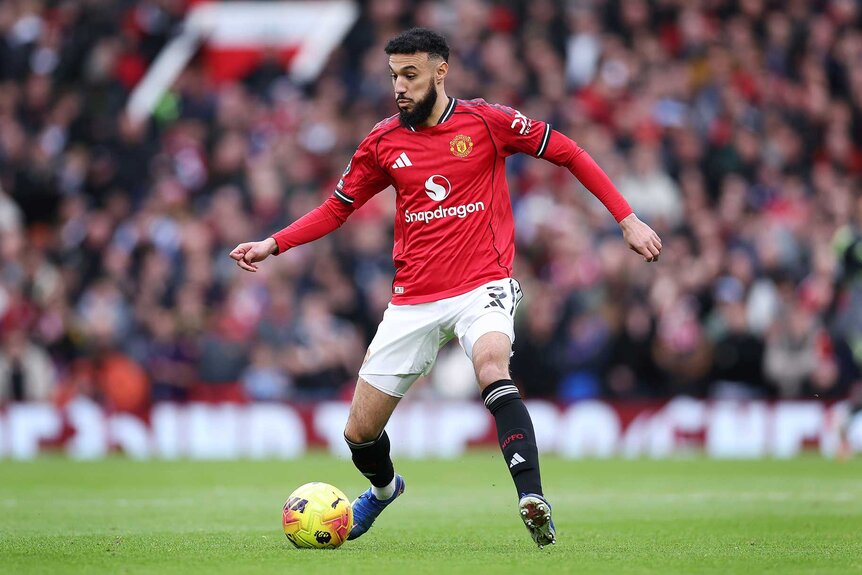 Noussair Mazraoui of Manchester United dribbling a ball during the Premier League match between Manchester United and Crystal Palace.