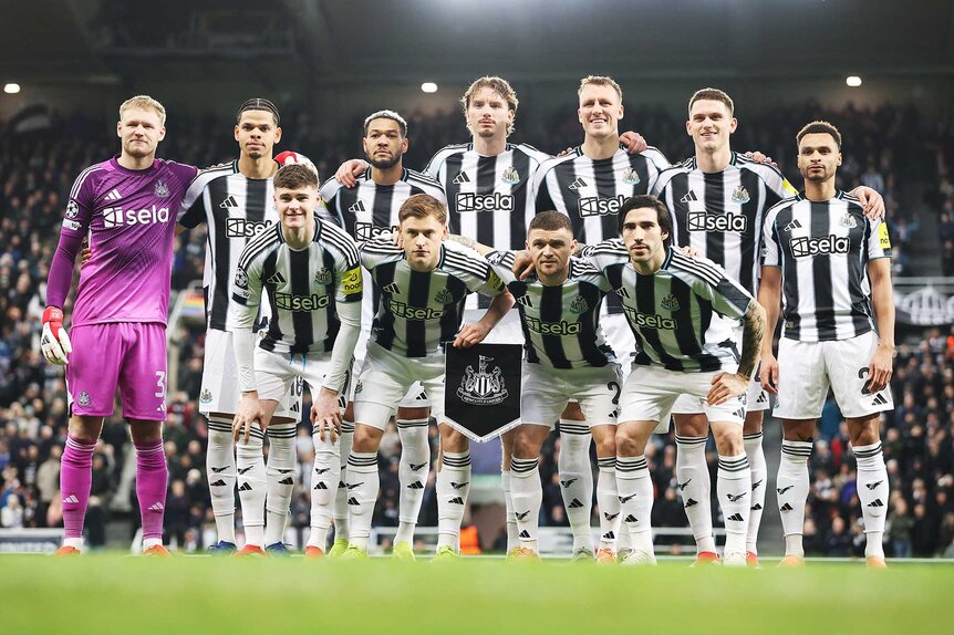 Players of Newcastle United pose for a team photo prior to the UEFA Champions League.