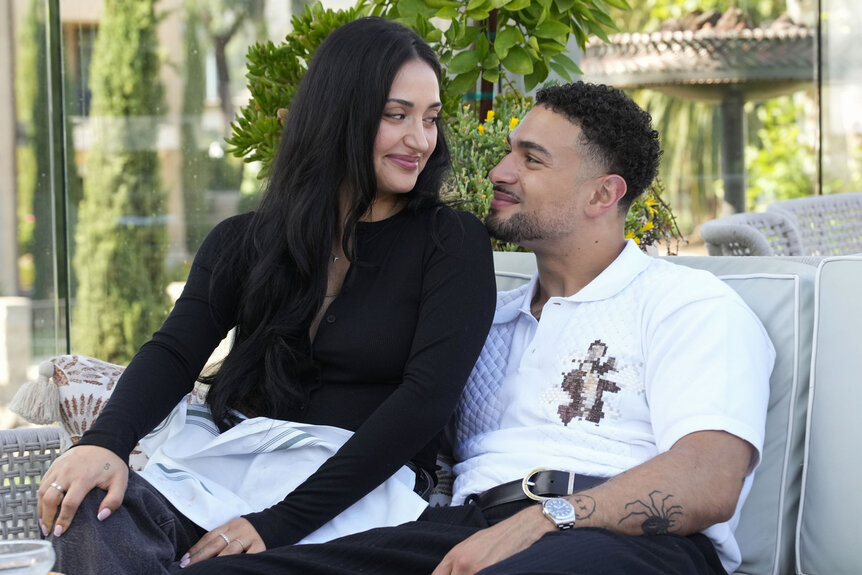 Leah Kateb and Miguel Harichi looking and smiliing at each other in Love Island: Beyond the Villa Season 1.