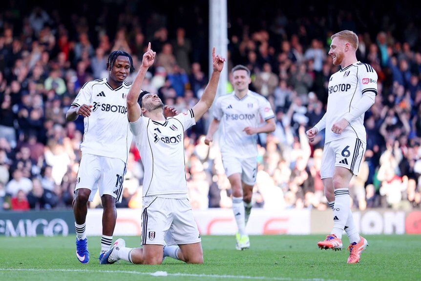 Raul Jimenez of Fulham celebrates scoring his team's third goal during the Premier League match between Fulham and Burnley.