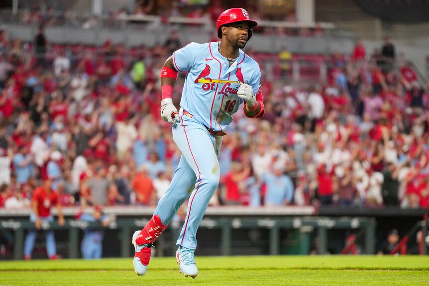 Jordan Walker of the St. Louis Cardinals rounds the bases after hitting a three-run home run in the sixth inning during the game between the St. Louis Cardinals and the Cincinnati Reds.
