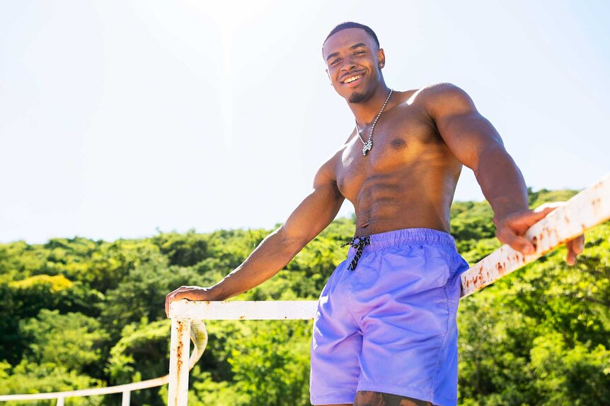 Kuman Dameon Chandler standing on the beach on Love Island USA Season 8.