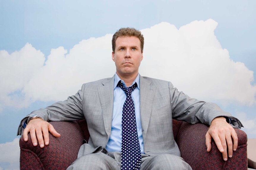 Harold Crick sitting in a chair in Stranger Than Fiction (2006).