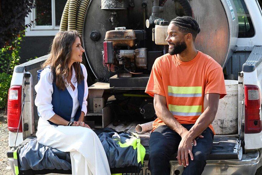 Dr. Lisa Paz and Mecca Amen talking in a truck on Married at First Sight Season 20 Episode 1.