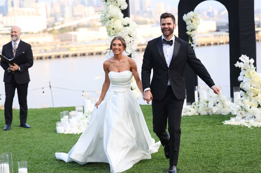 Courtney Landis and Nick Unlenhuth walking down the aisle on Married at First Sight Season 20 Episode 2.