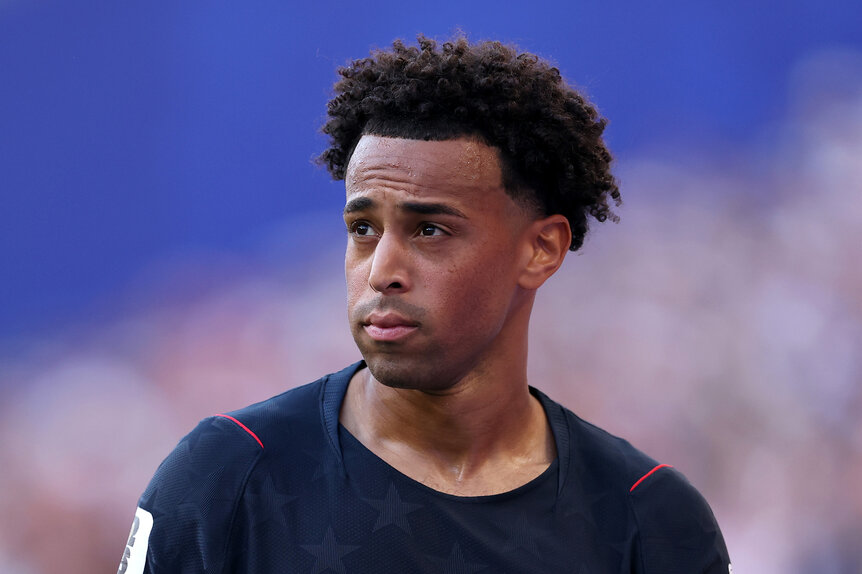 Tyler Adams #4 of the United States looks on during the FIFA World Cup 2026 Round Of 16 match between USA and Belgium at Seattle Stadium.