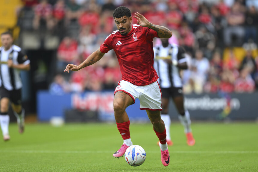 Morgan Gibbs-White of Nottingham Forest dribbling a soccer ball during a game.